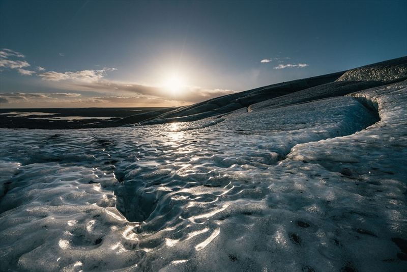 Wednesday 25th November 2015, Vatnajökull national park, Iceland: Photographer Mikael Buck with assistance from renowned local Icelandic guide Einar Runar Sigurdsson, explored the frozen world of Vatnajökull glacier in Iceland using Sony’s world first back-illuminated full-frame sensor – which features in the α7R II camera. His images were taken without use of a tripod or any image stitching techniques in photoshop. This was made possible through Sony’s new sensor technology, allowing incredibly detailed low-light hand held photography. Previously images this detailed would have required carrying bulky equipment to the caves, some of which can require hiking and climbing over a glacier for up to two hours to to access. This picture: The view on top of the Vatnajökull glacier whilst hiking to access the caves PR Handout - editorial usage only. Photographer's details not to be removed from metadata or byline. For further information please contact Rochelle Collison at Hope & Glory PR on 020 7014 5306 or rochelle.collison@hopeandglorypr.com Copyright: © Mikael Buck / Sony 07828 201 042 / mikaelbuck@gmail.com