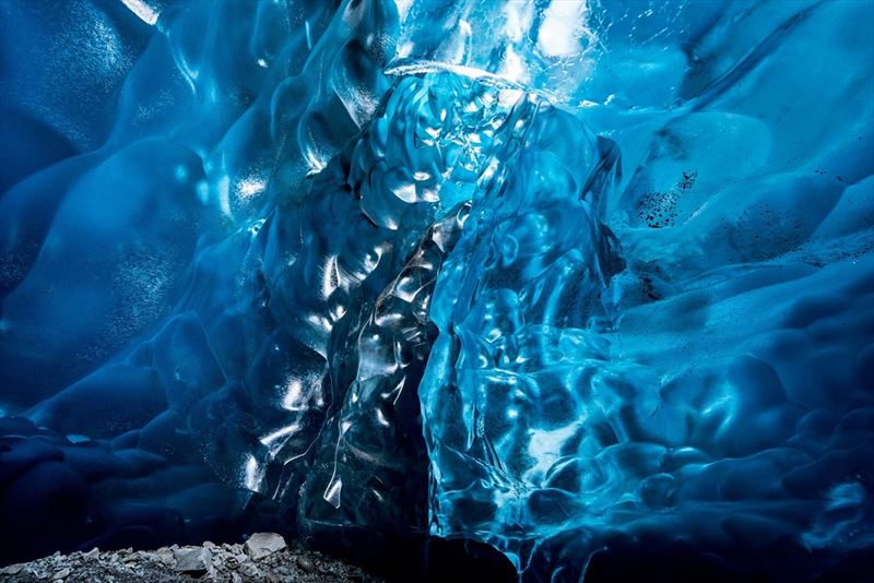 Wednesday 25th November 2015, Vatnajökull national park, Iceland: Photographer Mikael Buck with assistance from renowned local Icelandic guide Einar Runar Sigurdsson, explored the frozen world of Vatnajökull glacier in Iceland using Sony’s world first back-illuminated full-frame sensor – which features in the α7R II camera. His images were taken without use of a tripod or any image stitching techniques in photoshop. This was made possible through Sony’s new sensor technology, allowing incredibly detailed low-light hand held photography. Previously images this detailed would have required carrying bulky equipment to the caves, some of which can require hiking and climbing over a glacier for up to two hours to to access. This picture: Inside the 'ABC cave' - which stands for Amazing Blue Cave.  PR Handout - editorial usage only. Photographer's details not to be removed from metadata or byline. For further information please contact Rochelle Collison at Hope & Glory PR on 020 7014 5306 or rochelle.collison@hopeandglorypr.com Copyright: © Mikael Buck / Sony 07828 201 042 / mikaelbuck@gmail.com