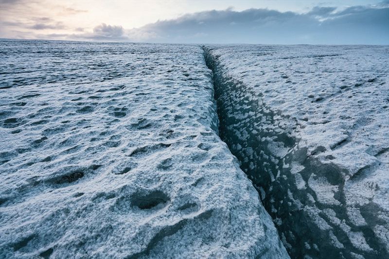 Wednesday 25th November 2015, Vatnajökull national park, Iceland: Photographer Mikael Buck with assistance from renowned local Icelandic guide Einar Runar Sigurdsson, explored the frozen world of Vatnajökull glacier in Iceland using Sony’s world first back-illuminated full-frame sensor – which features in the α7R II camera. His images were taken without use of a tripod or any image stitching techniques in photoshop. This was made possible through Sony’s new sensor technology, allowing incredibly detailed low-light hand held photography. Previously images this detailed would have required carrying bulky equipment to the caves, some of which can require hiking and climbing over a glacier for up to two hours to to access. This picture: On top of the Vatnajökull glacier PR Handout - editorial usage only. Photographer's details not to be removed from metadata or byline. For further information please contact Rochelle Collison at Hope & Glory PR on 020 7014 5306 or rochelle.collison@hopeandglorypr.com Copyright: © Mikael Buck / Sony 07828 201 042 / mikaelbuck@gmail.com